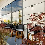 Hotel Qosmo 4*